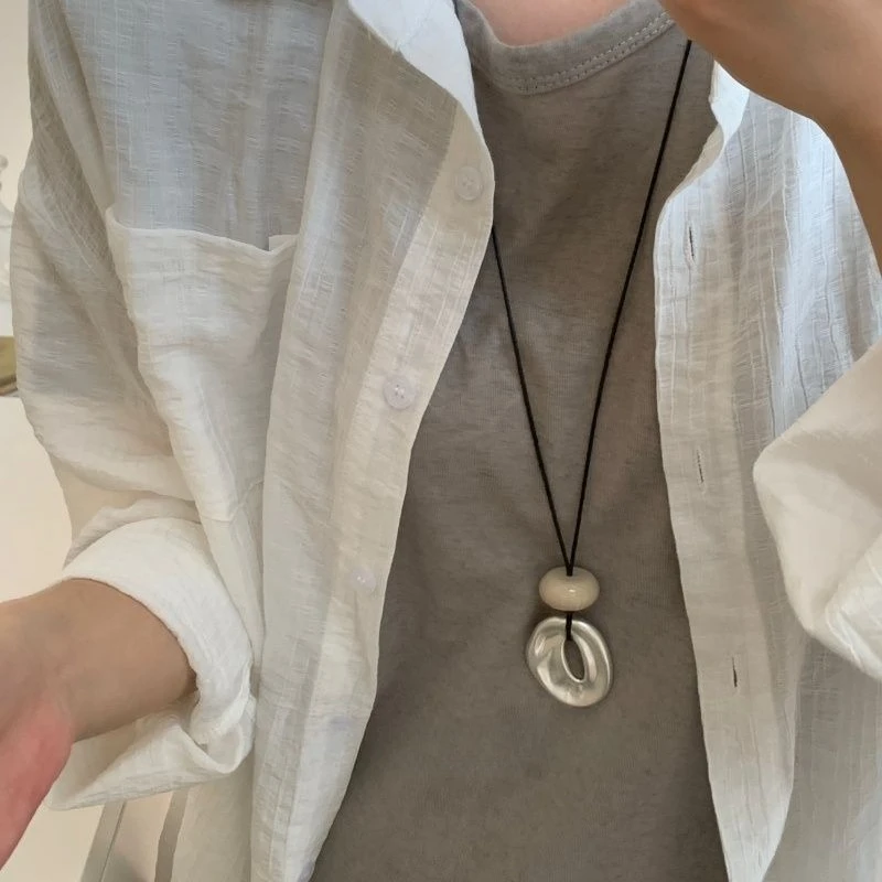 MattStone Oval — Hollow Irregular Matte Stone Pendant Necklace