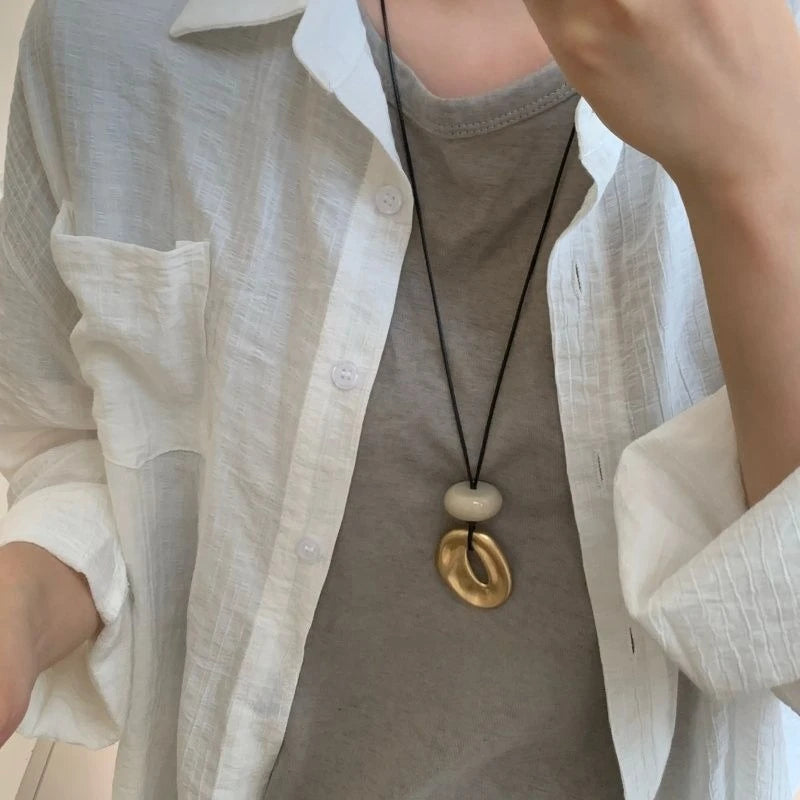 MattStone Oval — Hollow Irregular Matte Stone Pendant Necklace