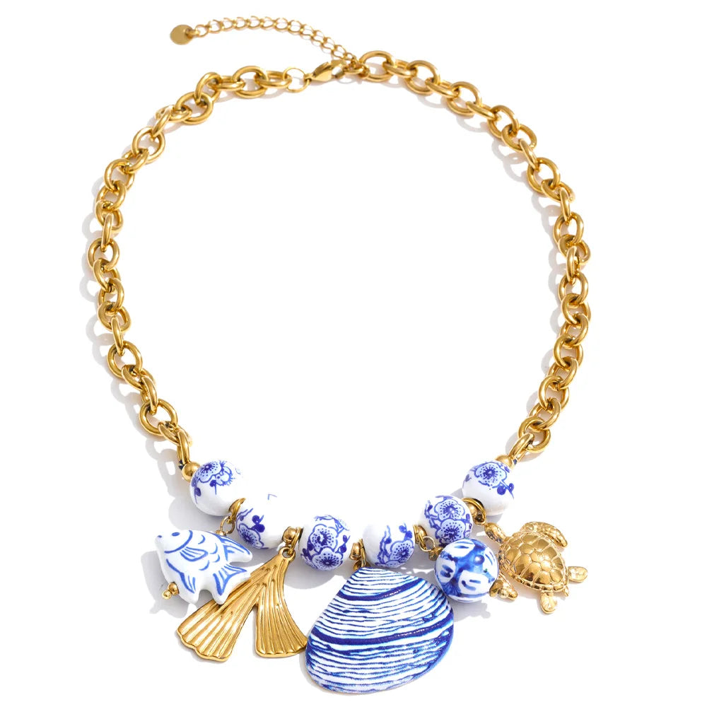 Ocean Catch — Stainless Steel Blue Ceramic Bead Fish & Shell Drop Statement Necklace