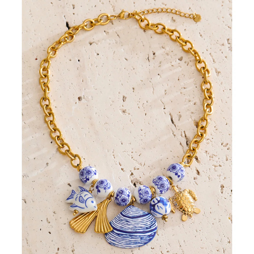 Ocean Catch — Stainless Steel Blue Ceramic Bead Fish & Shell Drop Statement Necklace